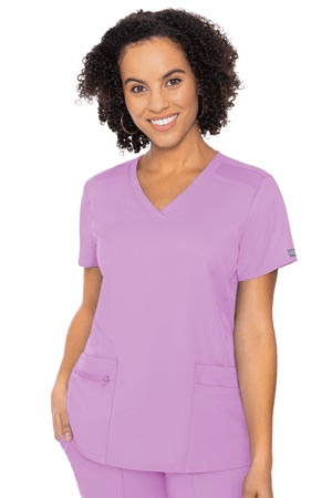 Lilac  4 Pocket Top #7468 Feeling is believing. From the thoughtfully placed front pockets to the fabulously breathable knit back youll love everything about this classic scrub top made with our super-soft wrinkle-free Touch Performance fabric. • V-neck collar • Three patch pockets • One zipper pocket • Shoulder seam detail • Breathable rib-knit back • Touch Performance Fabric • R: XS-5X (27in.)